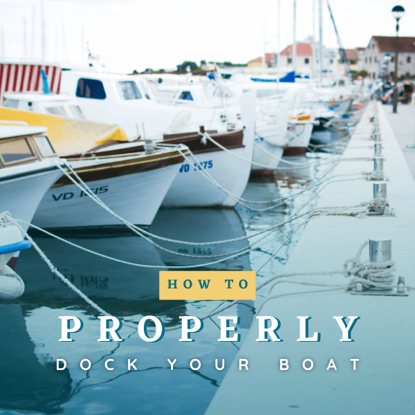 A line of boats tied to a dock